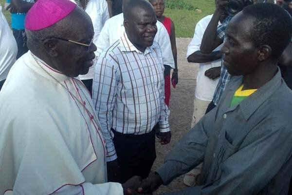 ArchbishopOdamaWelcomes Omona,.JPG (51076 bytes)