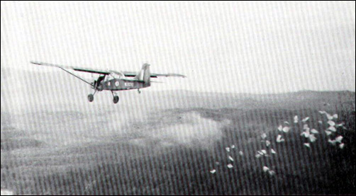 A Mark 4 RAF Auster disseminating propaganda leaflets